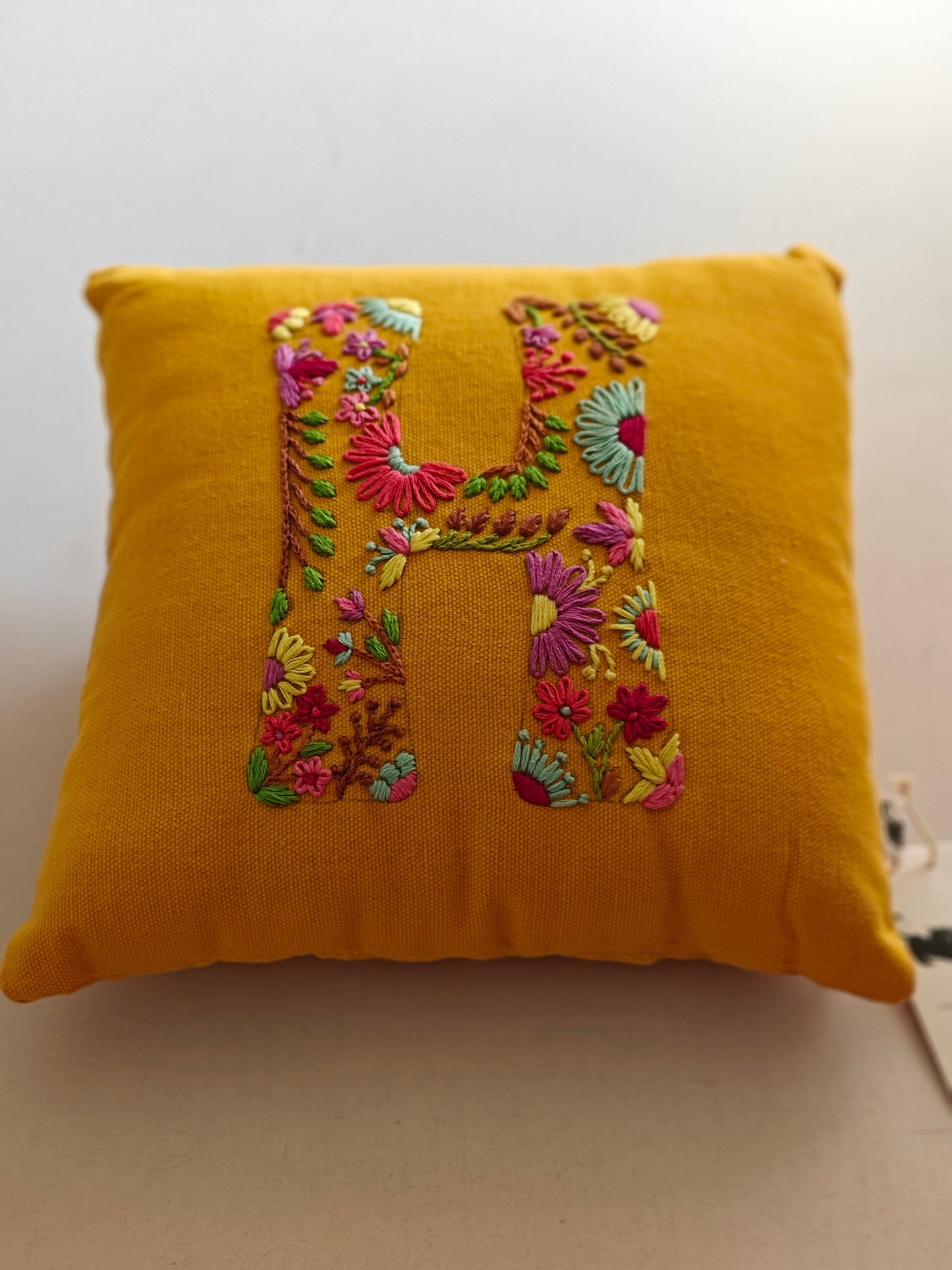 Hand Embroidered Customised Alphabet Cotton Cushion 10*10 Inches