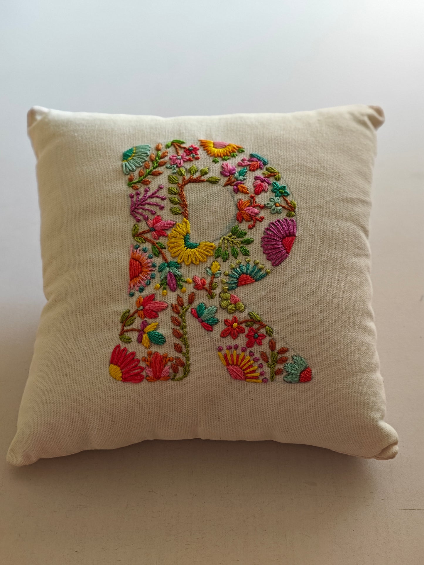 Hand Embroidered Customised Alphabet Cotton Cushion 10*10 Inches