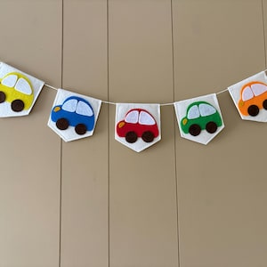 Kirsten’s customer photo of the colourful felt car bunting